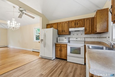 Desirable lake community, a classic raised ranch with loads of - photo 5