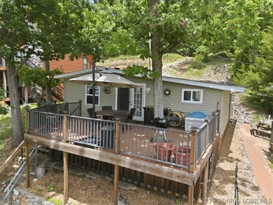 Enjoy the Lake of the Ozarks lifestyle with this charming Rocky - photo 1