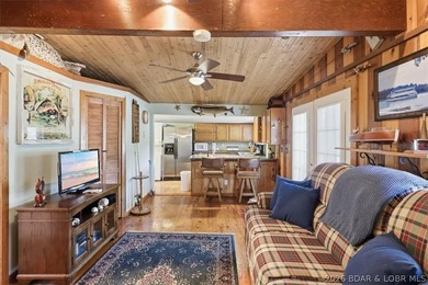 Enjoy the Lake of the Ozarks lifestyle with this charming Rocky - photo 7
