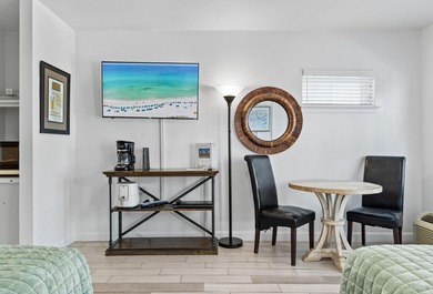 This charming fully furnished studio condo is just steps from - photo 4