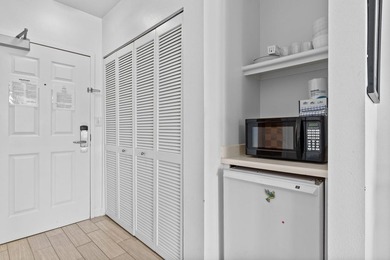 This charming fully furnished studio condo is just steps from - photo 7