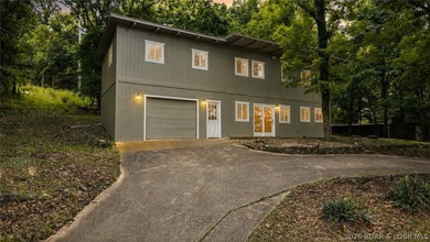 Welcome to 338 Crane Cove - a stunning, fully remodeled Lake of - photo 1