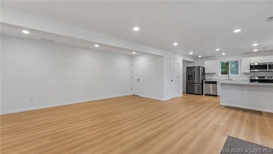 Welcome to 338 Crane Cove - a stunning, fully remodeled Lake of - photo 7