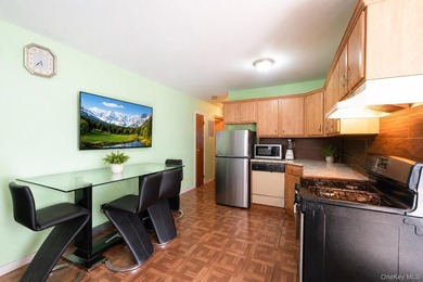 Rare opportunity to own an end-unit, ground-floor condo with a - photo 12