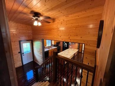 This 4BR, 2BA Rainy Lake property offers 100' of accessible - photo 13