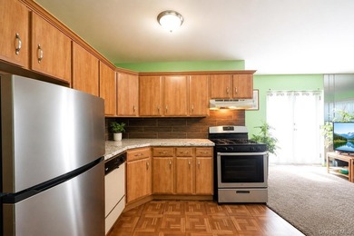 Rare opportunity to own an end-unit, ground-floor condo with a - photo 16
