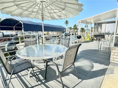 PARADISE AWAITS! Canal front home Gulf access 15 minutes to the