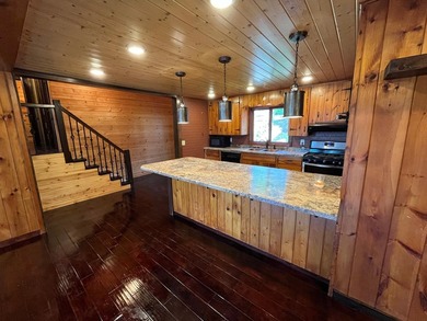 This 4BR, 2BA Rainy Lake property offers 100' of accessible - photo 19