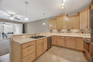 Experience carefree lake living at Sunset Palms, one of Lake of - photo 5