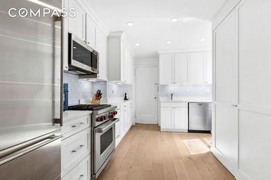 This beautifully renovated two-bedroom, two-bath has a huge - photo 1