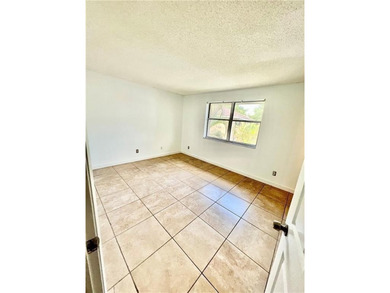 Vacant. all tile , granite countertop, 2 parking spaces - photo 12