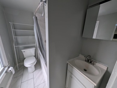 Nicely Renovated Single Family Row Home. Two Story, Three - photo 14
