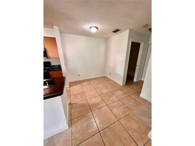 Vacant. all tile , granite countertop, 2 parking spaces - photo 15