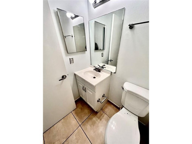 Vacant. all tile , granite countertop, 2 parking spaces - photo 16