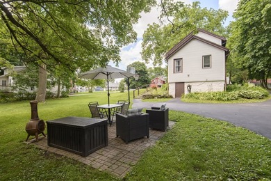 This stunning home is located on a hill overlooking Pewaukee - photo 17