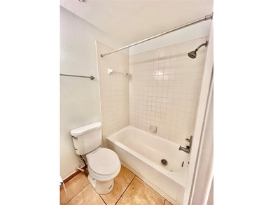 Vacant. all tile , granite countertop, 2 parking spaces - photo 23