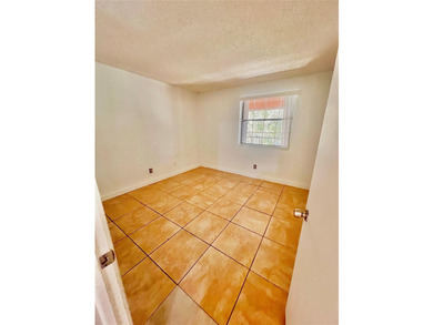 Vacant. all tile , granite countertop, 2 parking spaces - photo 25