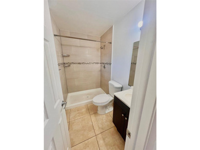 Vacant. all tile , granite countertop, 2 parking spaces - photo 26