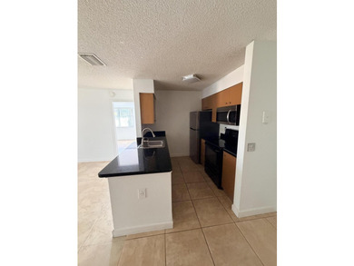 Vacant. all tile , granite countertop, 2 parking spaces - photo 42