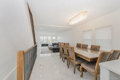 Welcome to this elegant single-family residence nestled in the - photo 1