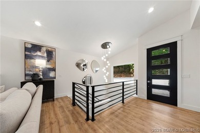 Experience luxury lakefront living in this fully furnished - photo 5