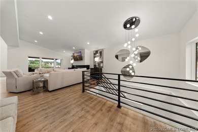 Experience luxury lakefront living in this fully furnished - photo 6
