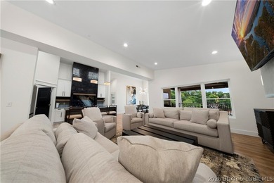 Experience luxury lakefront living in this fully furnished - photo 7