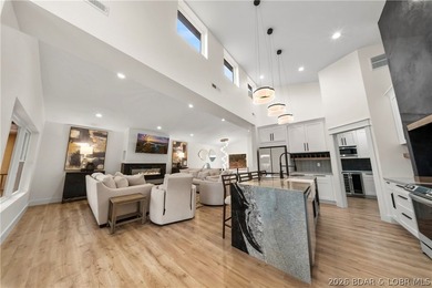 Experience luxury lakefront living in this fully furnished - photo 10