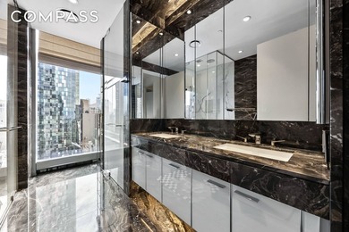 *Experience the height of luxury in Residence 36D, a - photo 8