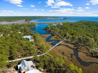 Tucked inside the private, gated community of RiverCamps, this - photo 3
