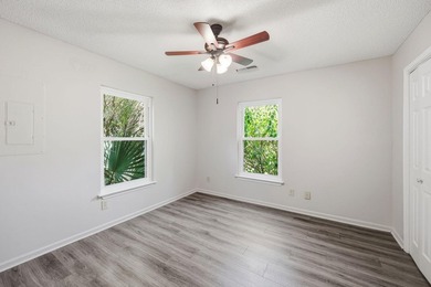 Nestled behind mature native landscaping, this home doesn't just - photo 12