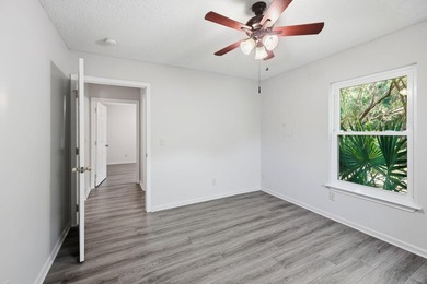 Nestled behind mature native landscaping, this home doesn't just - photo 13