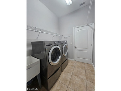 This spacious 4-bedroom, 3-bath home offers a bright and open - photo 14