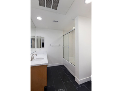 Welcome to 150 The Promenade N #202, a fully renovated - photo 15