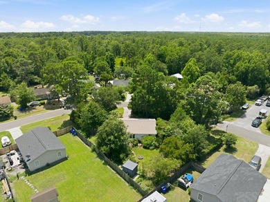 Nestled behind mature native landscaping, this home doesn't just - photo 19