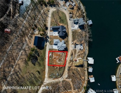 Footings have already been poured on this 1/4-acre lot - photo 1