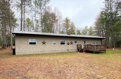 Lake Home Off Market in Sugar Camp, Wisconsin