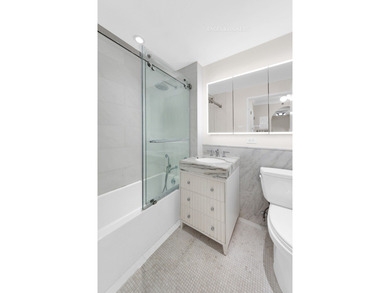 Sunny South-Facing One-Bedroom with City Views

Perched on the - photo 8