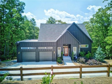100+ FEET OF CHATTAHOOCHEE RIVER FRONTAGE AND A MODERN HOME TO - photo 2