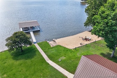 Lakefront living on the desirable 53 Mile Marker! Nestled in the - photo 7