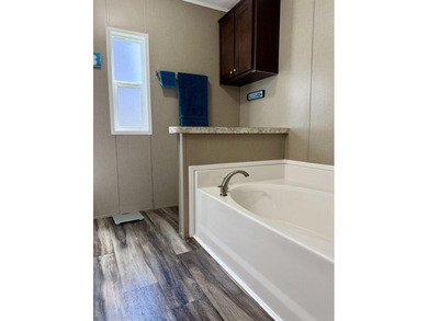 Beautiful 3-bedroom, 2-bath home sits in the popular 55+ - photo 11