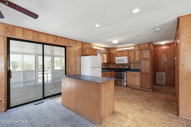This charming home features three bedrooms & three full - photo 12