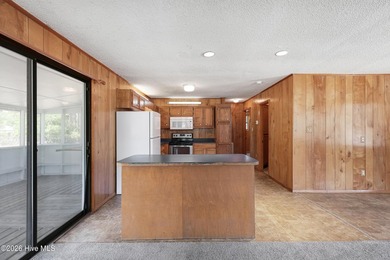 This charming home features three bedrooms & three full - photo 13