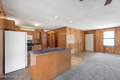 This charming home features three bedrooms & three full - photo 14