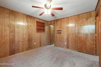 This charming home features three bedrooms & three full - photo 17