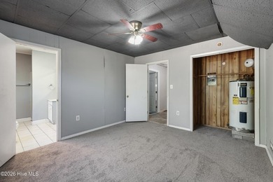 This charming home features three bedrooms & three full - photo 24