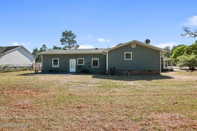 This charming home features three bedrooms & three full - photo 30
