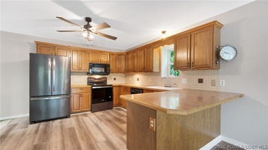 Move-in ready home offering an unbeatable location by both land - photo 5