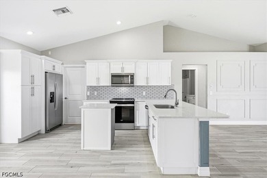 Welcome to this beautifully updated home where modern finishes - photo 11