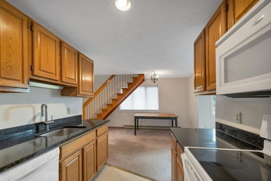 Nestled in the desirable Village at Riverbend community, this - photo 8